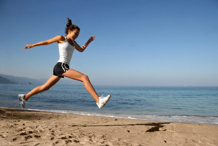girl running on the beach girl running on the beach